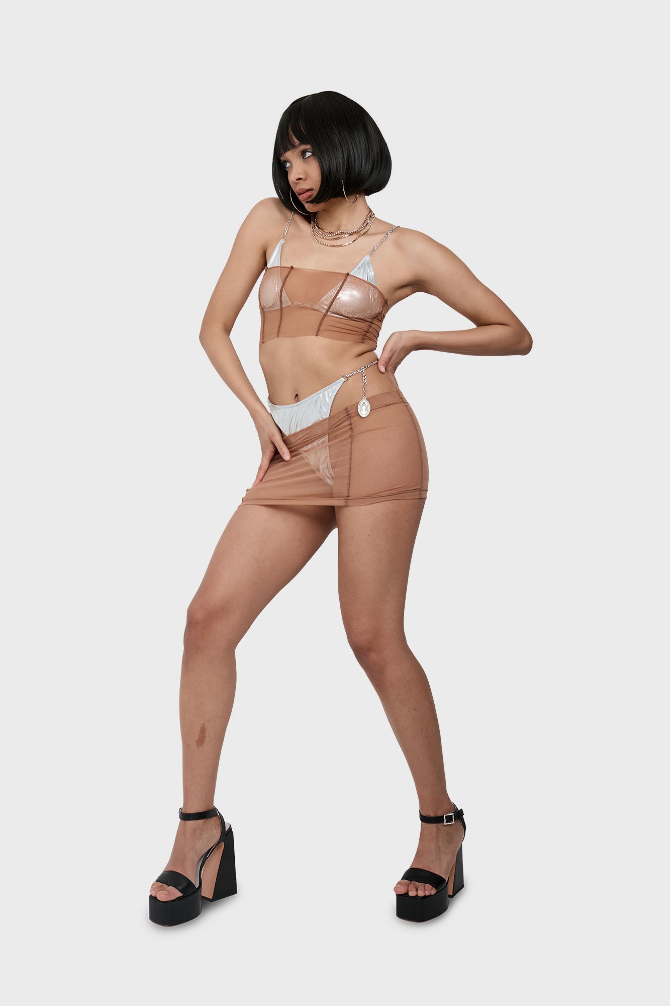 Nude mini skirt